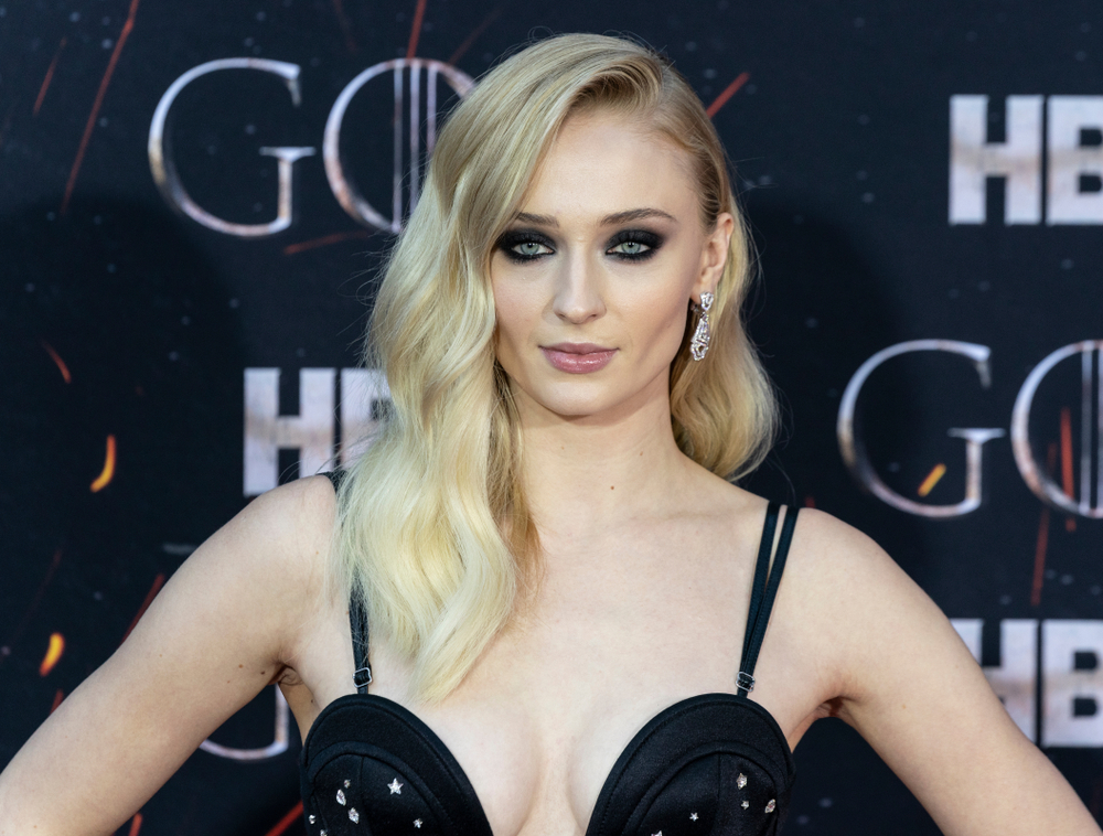 Actor Sophie Turner on the red carpet at a Game of Thrones event.
