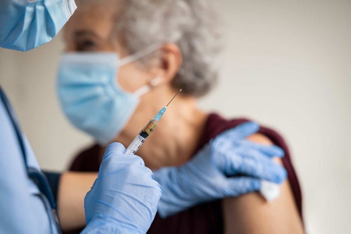 Older woman getting COVID vaccine