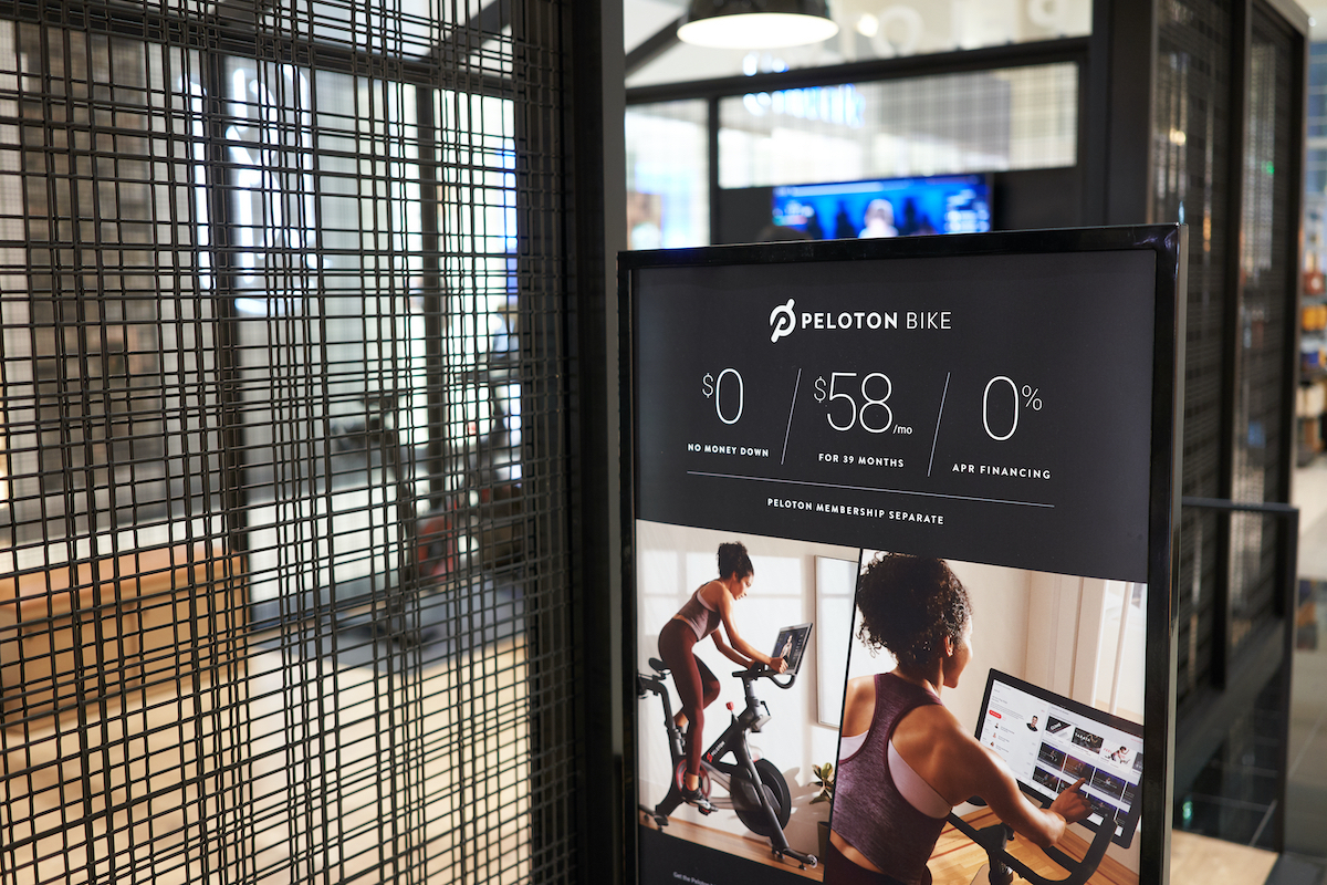 Tigard, Oregon, USA - Sep 28, 2019: Peloton bike monthly payment plan advertisement is seen outside a Peloton showroom in Washington Square Shopping Center in Tigard.
