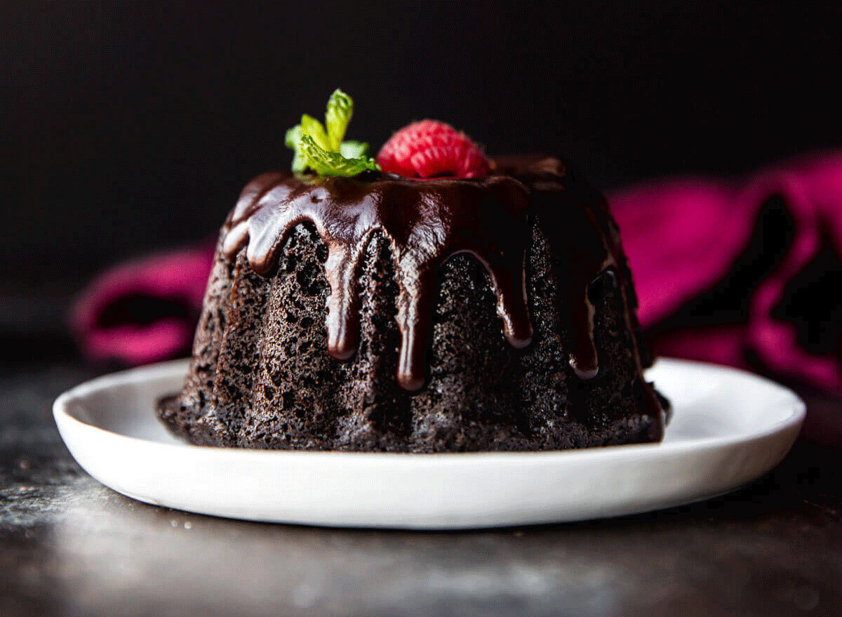 red wine chocolate ganache on a chocolate bundt cake with fruit