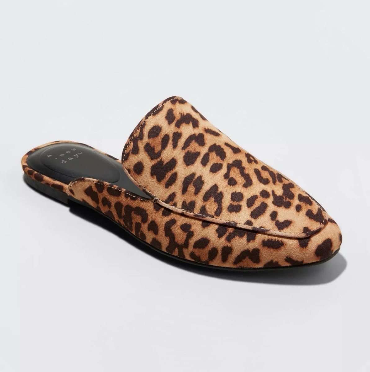 leopard print slide shoes on white background