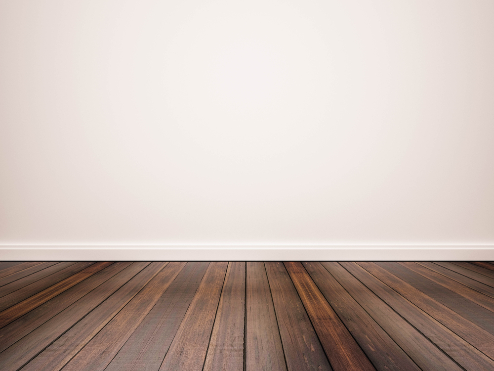 hardwood floors against white wall