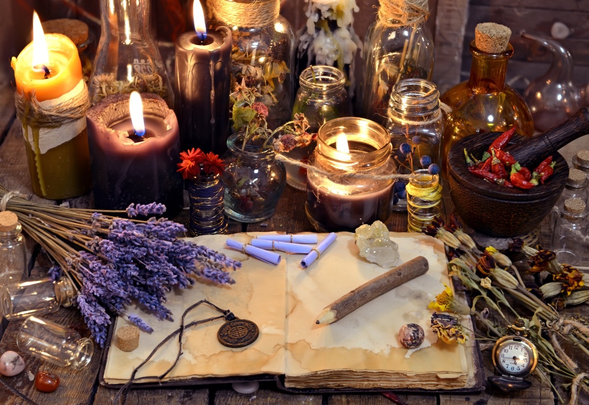 open book with healing herbs