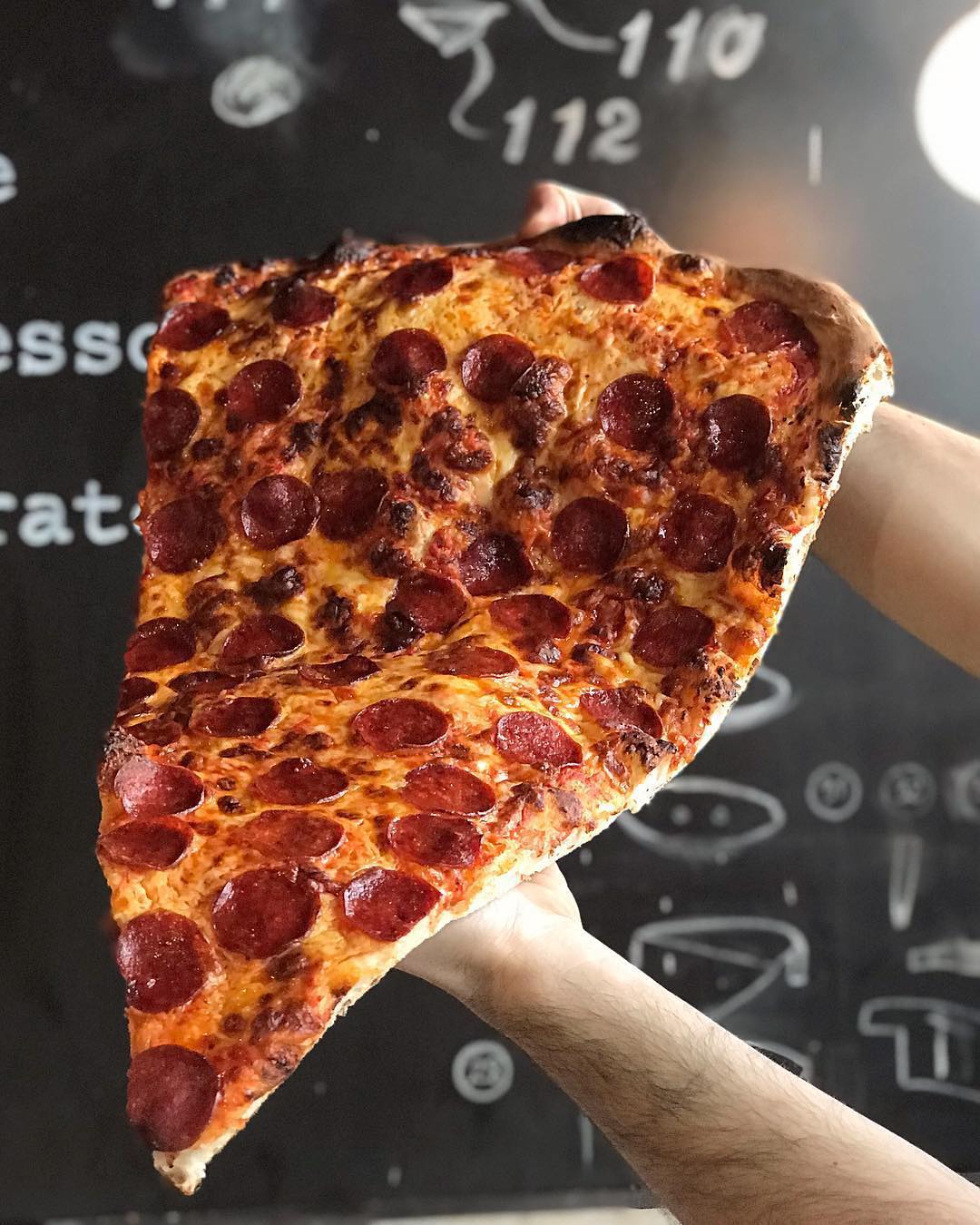 Creative pizza combinations | New Foodie Trend Is A Giant Pizza Slice – The Biggest You've Seen | Her Beauty
