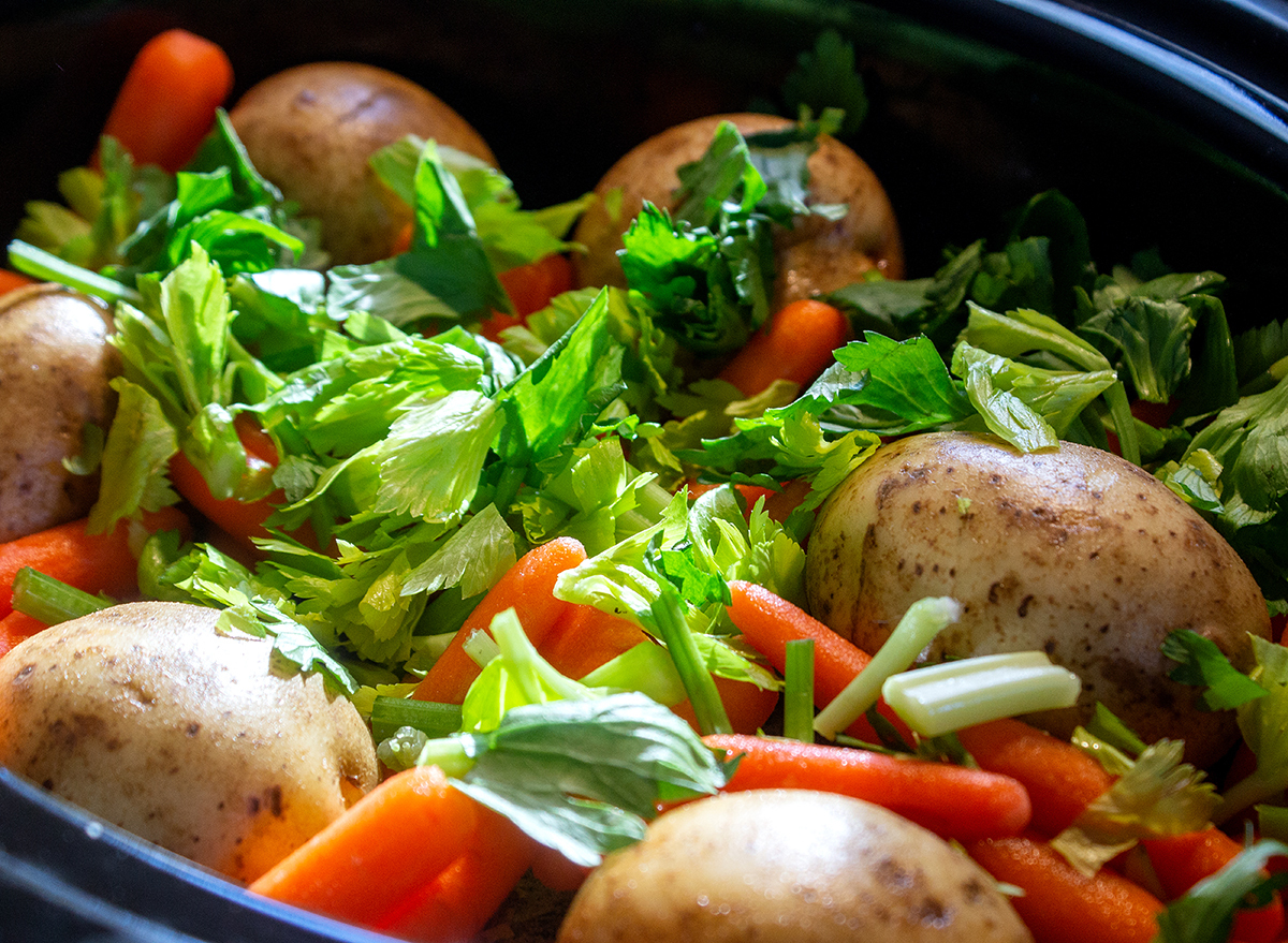 vegetables and herbs in slow cooker