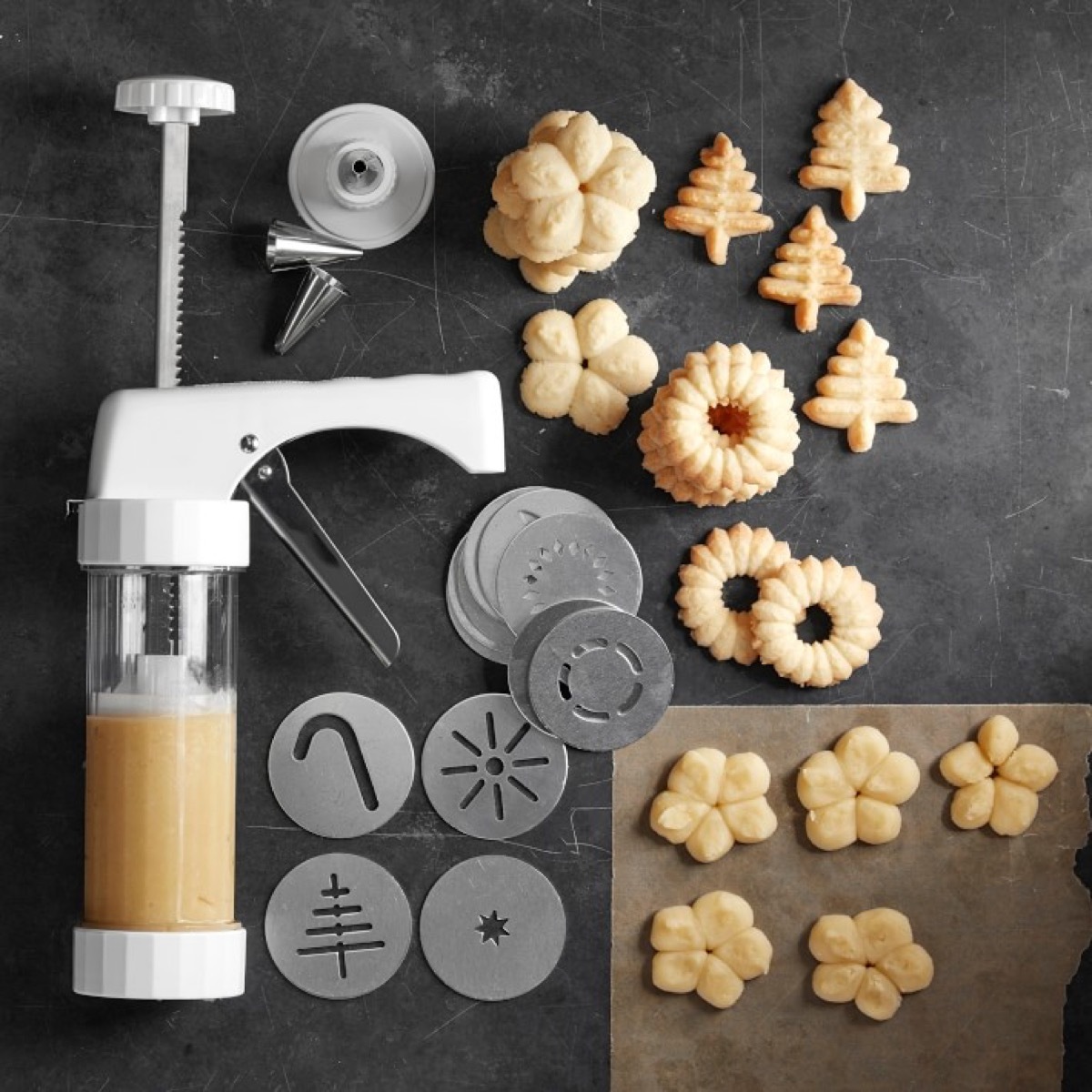 Cookie press with sample cookies