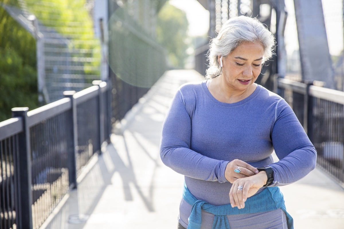  woman checking her fitness tracker