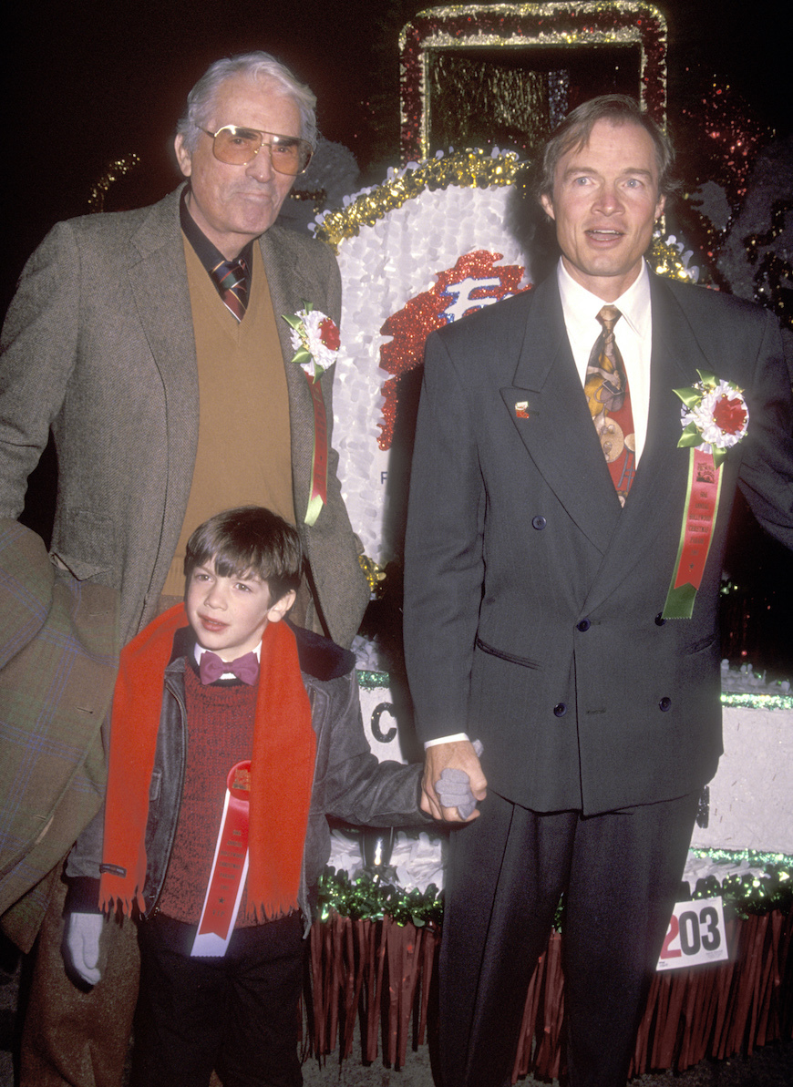 Actor Gregory Peck, son Stephen Peck and his son Ethan Peck attend the 60th Annual Hollywood Christmas Parade on December 1, 1991 at KTLA Studios in Hollywood, California.