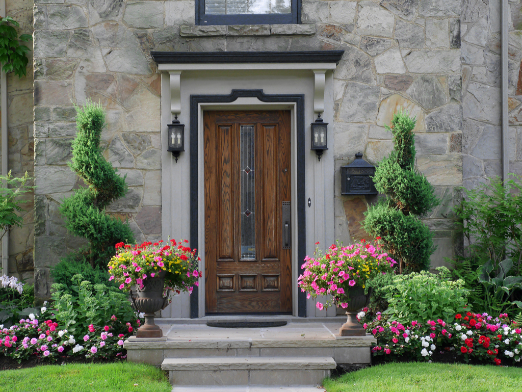 Home with Flowers Boosting Your Home's Curb Appeal