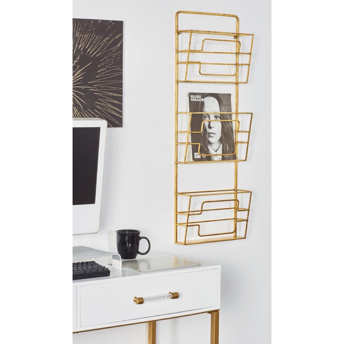 gold magazine rack in home office