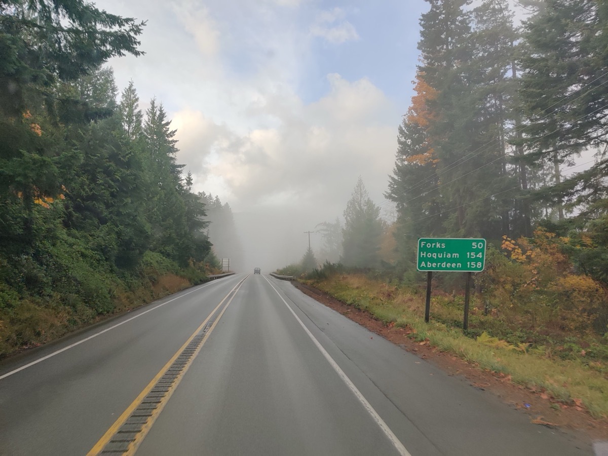 road sign for forks washington