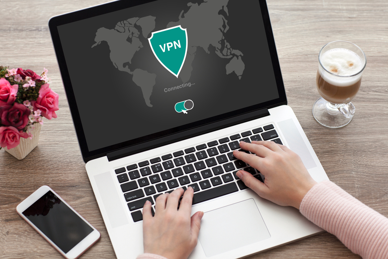 A close up of a laptop signing into a VPN