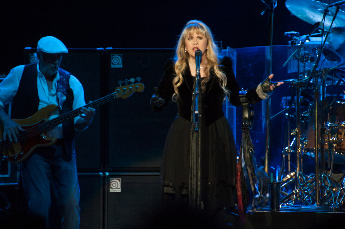John McVie and Stevie Nicks performing in 2013