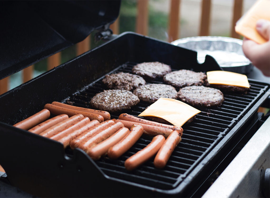 Hot dogs and burgers on grill