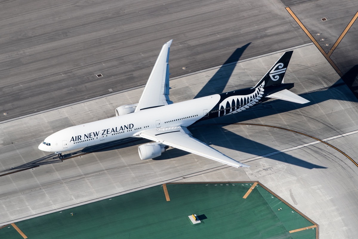 Los Angeles, USA - March 29, 2018: Air New Zealand Boeing 777 taxiing at Los Angeles Int. Airport seen from a helicopter. Air New Zealand Limited is the flag carrier airline of New Zealand. Based in Auckland, the airline operates scheduled passenger flights to 20 domestic and 31 international destinations in 19 countries around the Pacific Rim and the United Kingdom. The airline has been a member of the Star Alliance since 1999.
