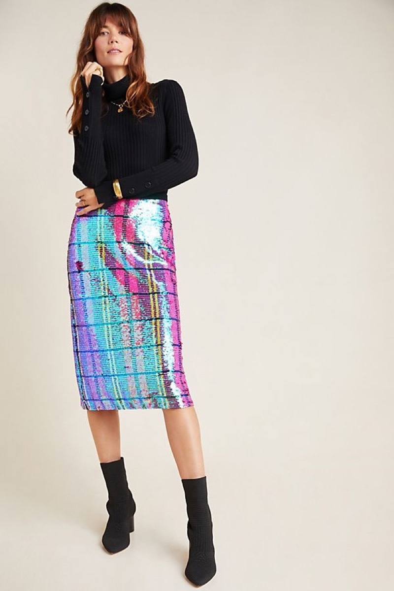 Stylish woman in iridescent skirt