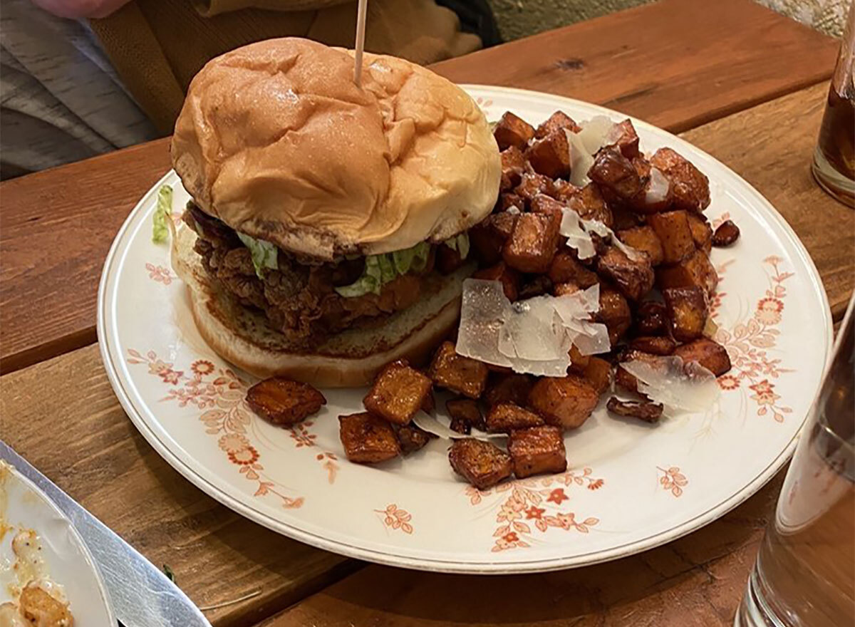fried chicken sandwich with home fries