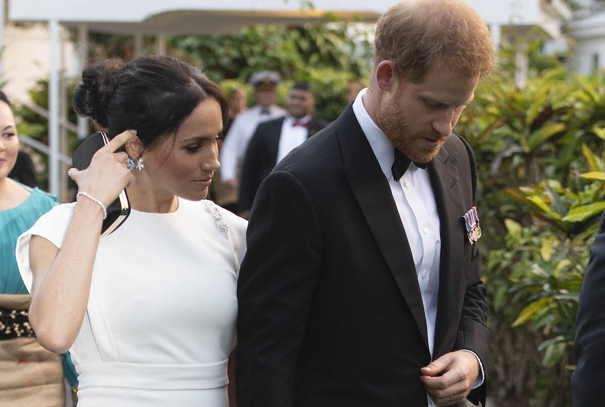 Prince Harry, Duke of Sussex and Meghan, Duchess of Sussex attend a state dinner at the Royal Residence on October 25, 2018 in Nuku'alofa, Tonga. She wears Diana's aquamarine ring.