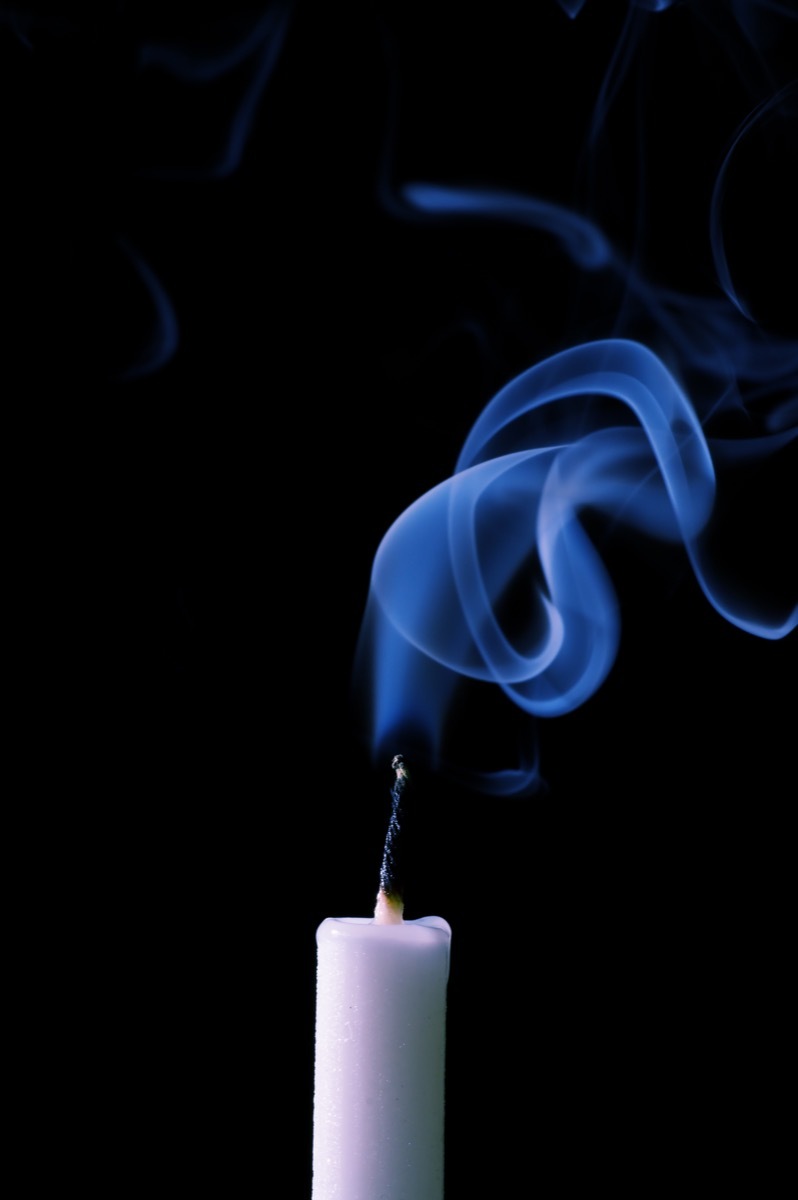 candle with blue flame