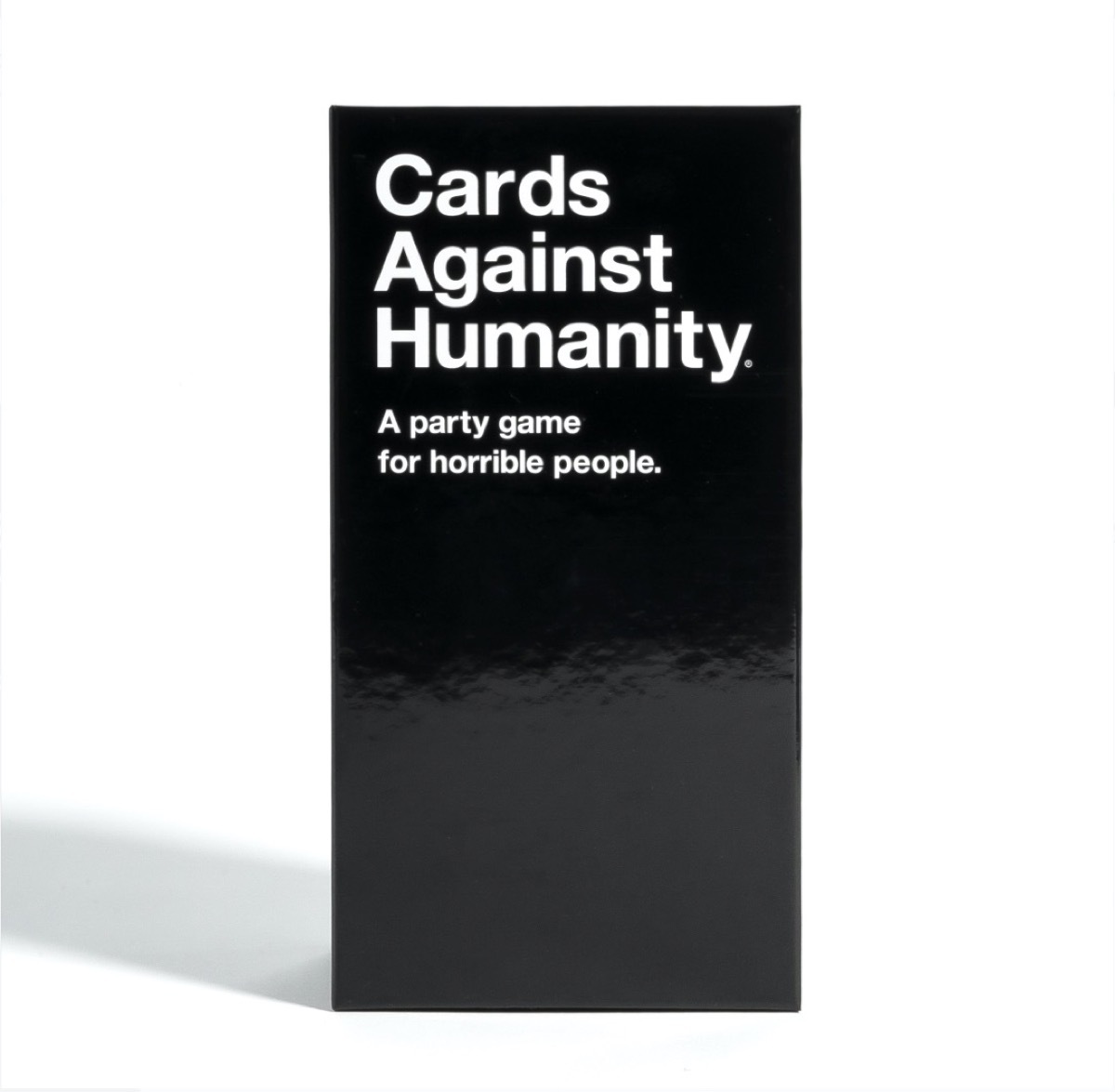 black box containing cards against humanity game