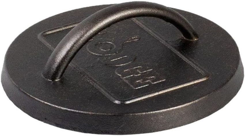 A Lodge cast-iron burger press