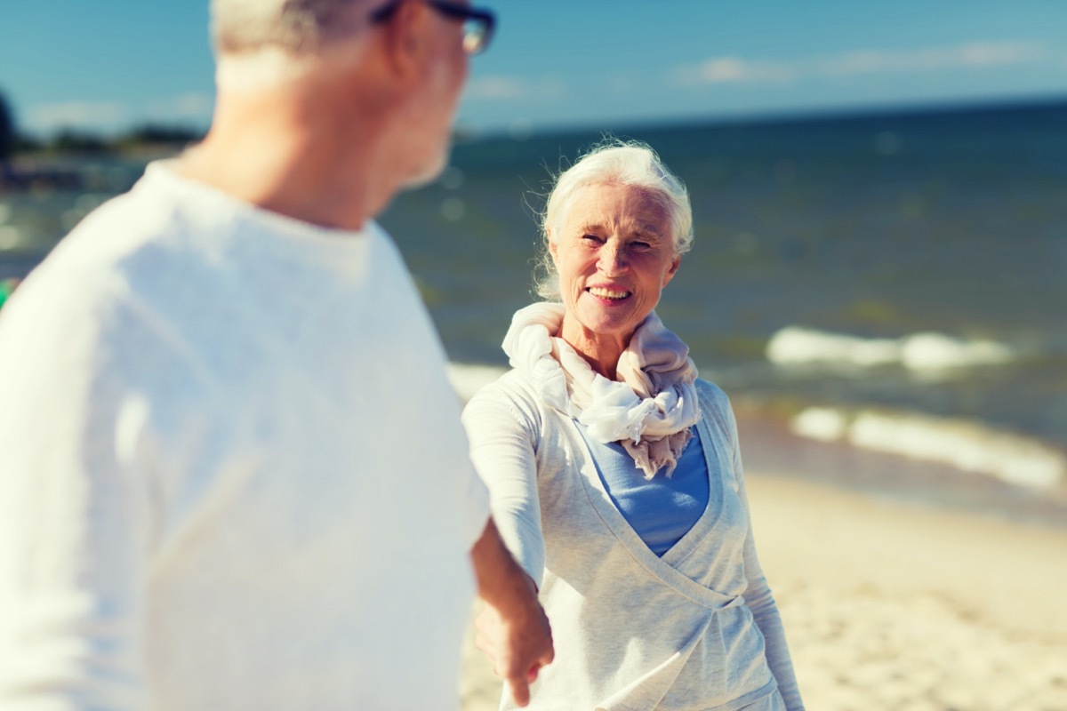 White senior man and woman on beach