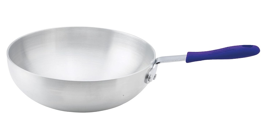 An aluminum stir fry pan