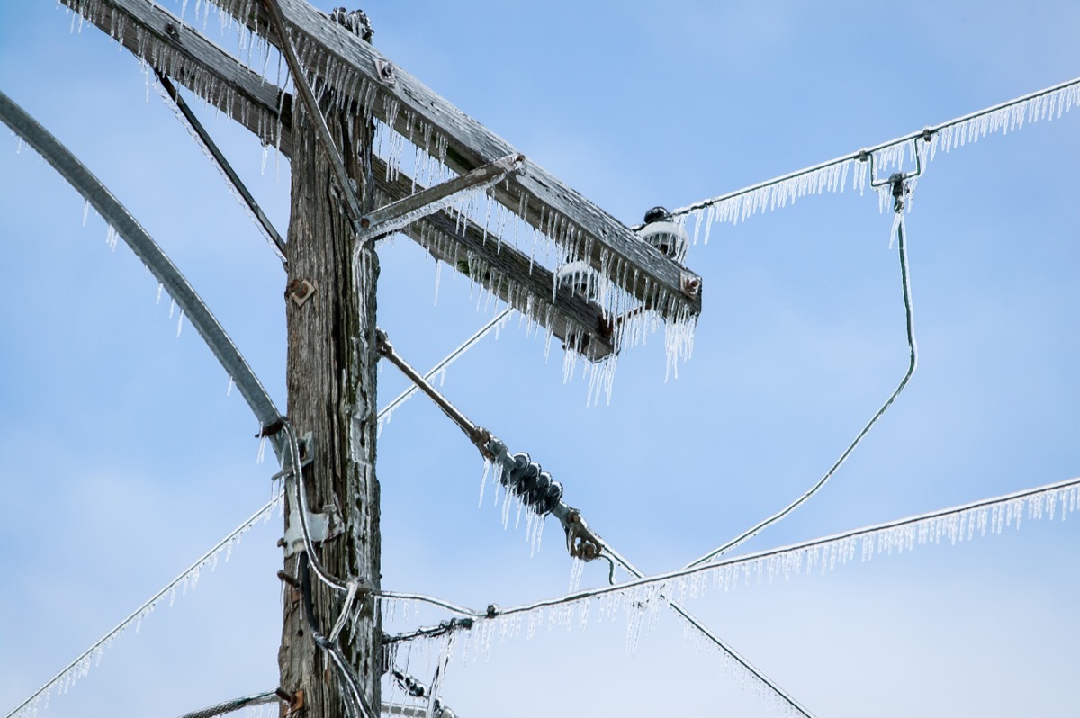 power line covered in ice in the air