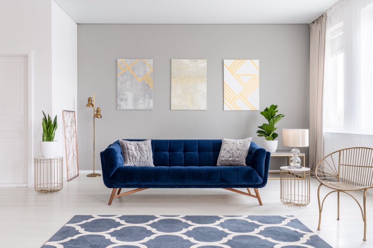 blue velvet chair in modern living room