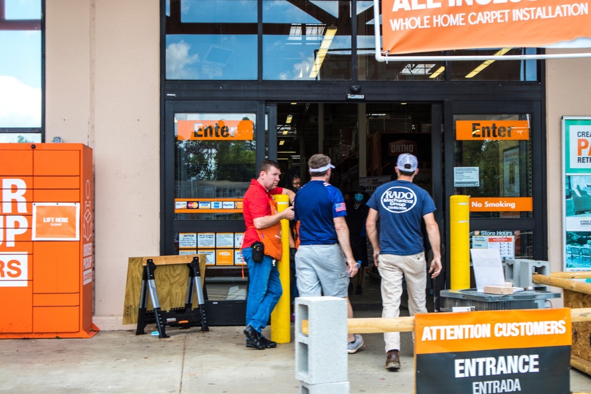 Home Depot retail store worker checks for coronavirus symptoms pandemic 2020