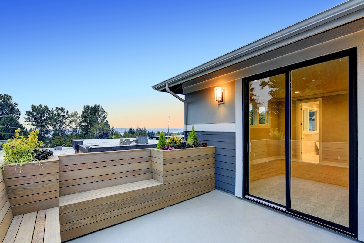 deck with custom built cedar bench and planter boxes, overlooking Lake Washington