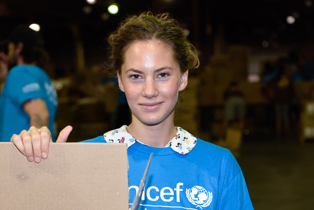 Emma Ferrer, Audrey Hepburn's Granddaughter, Joins UNICEF And UPS Volunteers In Packing Thousands Of Winter Survival Kits For Syrian Children on September 7, 2014 in Edison, New Jersey.