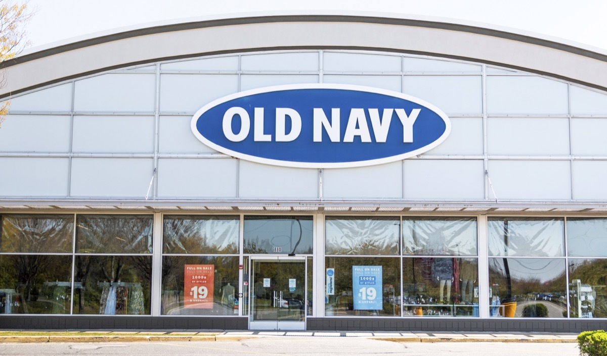 Bay Shore, New York, USA - 25 April 2020: The front of an Old Navy store in a strip mall empty due to the cdc rules during the coronavirus COVID-19 pandemic.