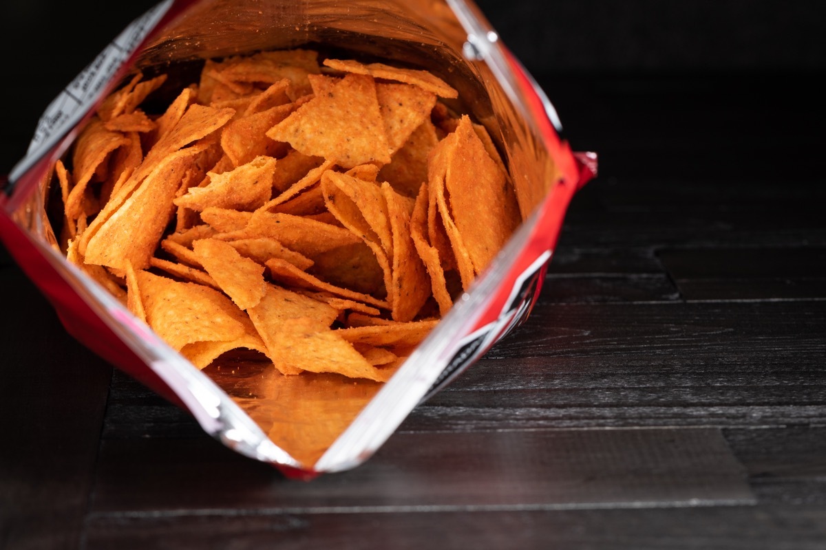 Closeup photo of a bag of nachos with chili