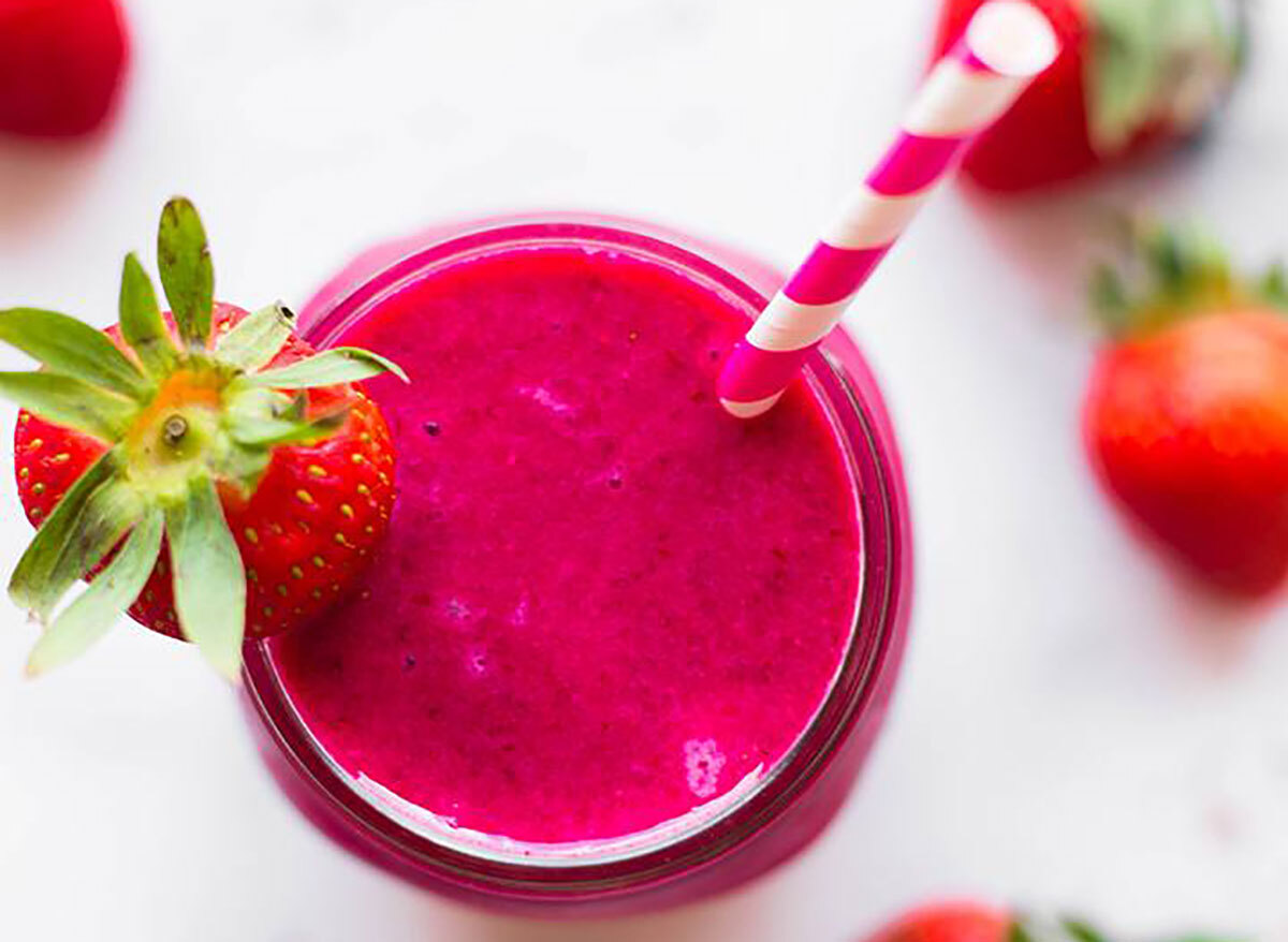 pink protein beet smoothie with straw