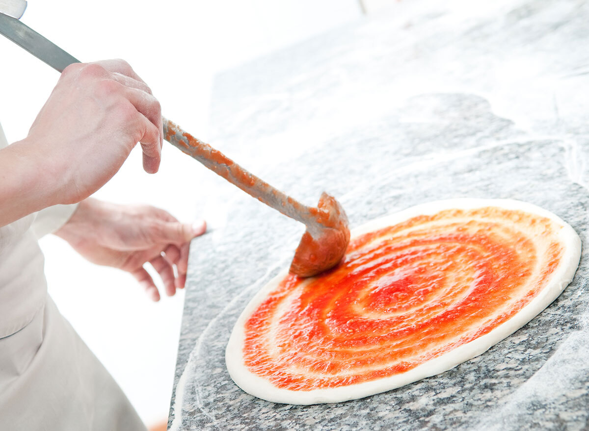 tomato sauce on pizza