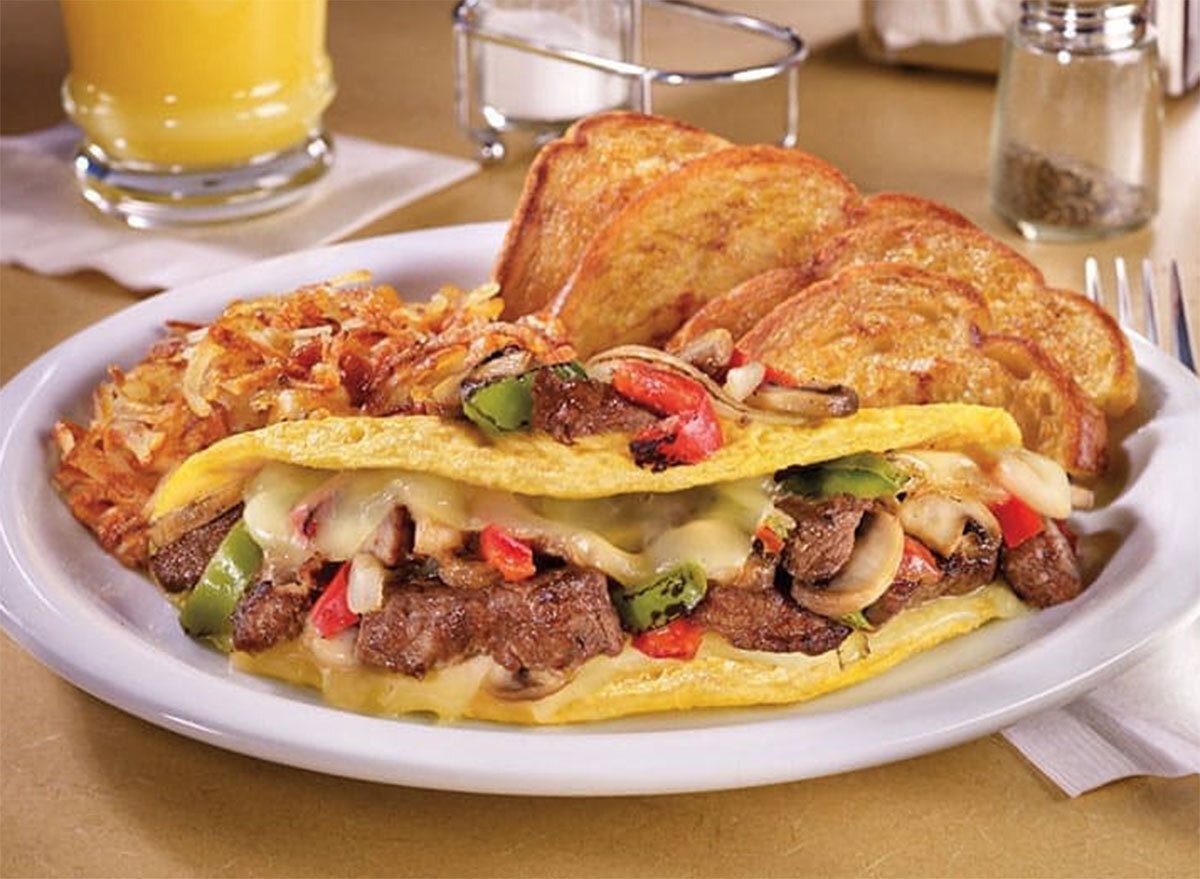 Philly cheesesteak omelette with hash browns