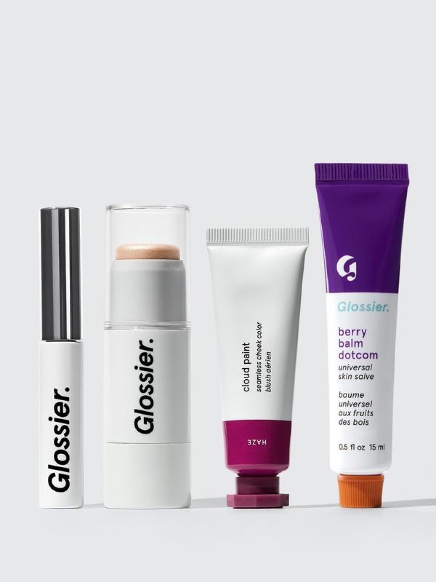 tubes of glossier products