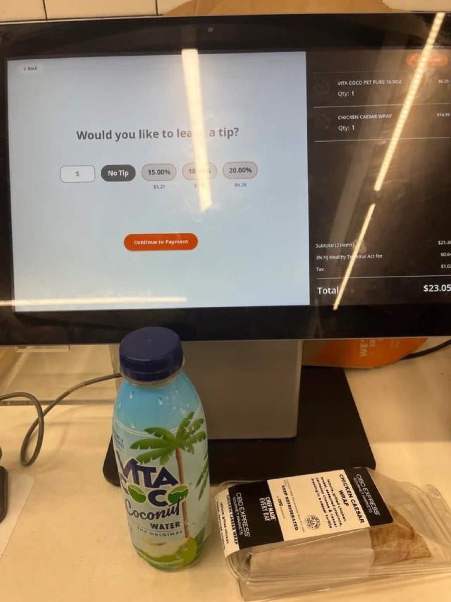 Reddit user posts photo showing a self-checkout tipping request at an airport