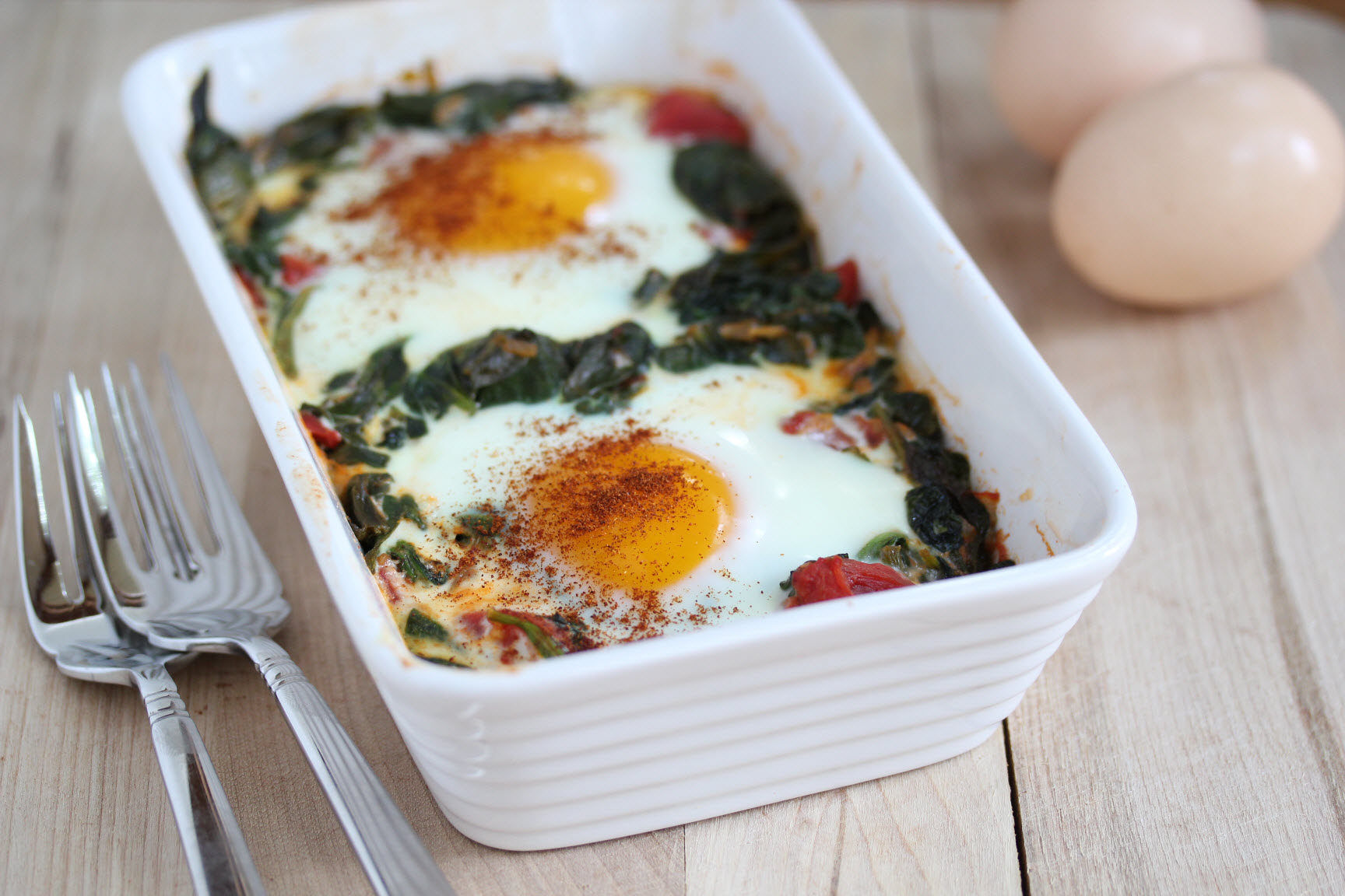 5. Baked Eggs with Spinach and Tomato