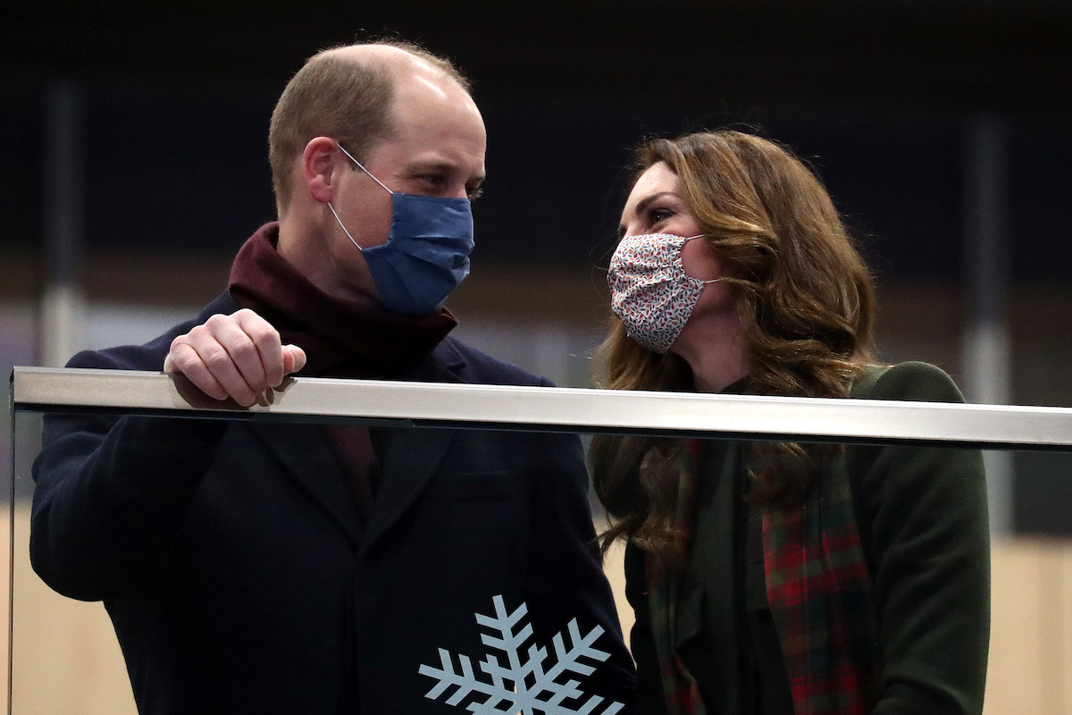 Prince William, Duke of Cambridge and Catherine, Duchess of Cambridge look on from the balcony at London Euston Station on December 06, 2020 in London, United Kingdom.