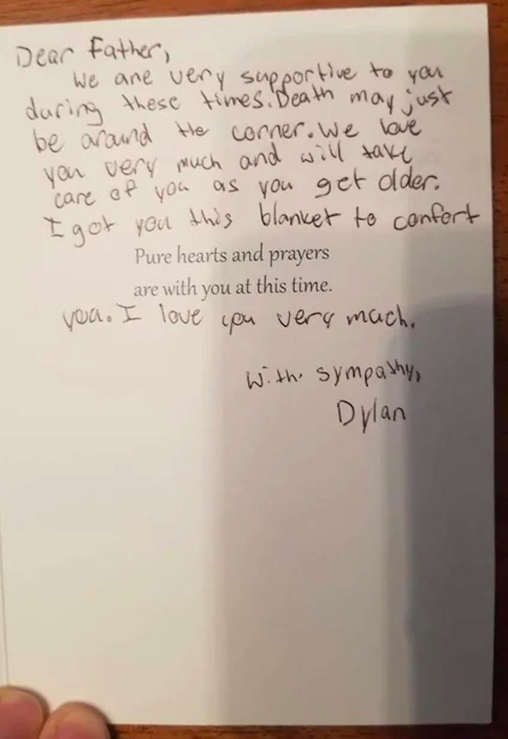 dylan vanleuven writes his father, simon, a sympathy card for his 40th birthday. 