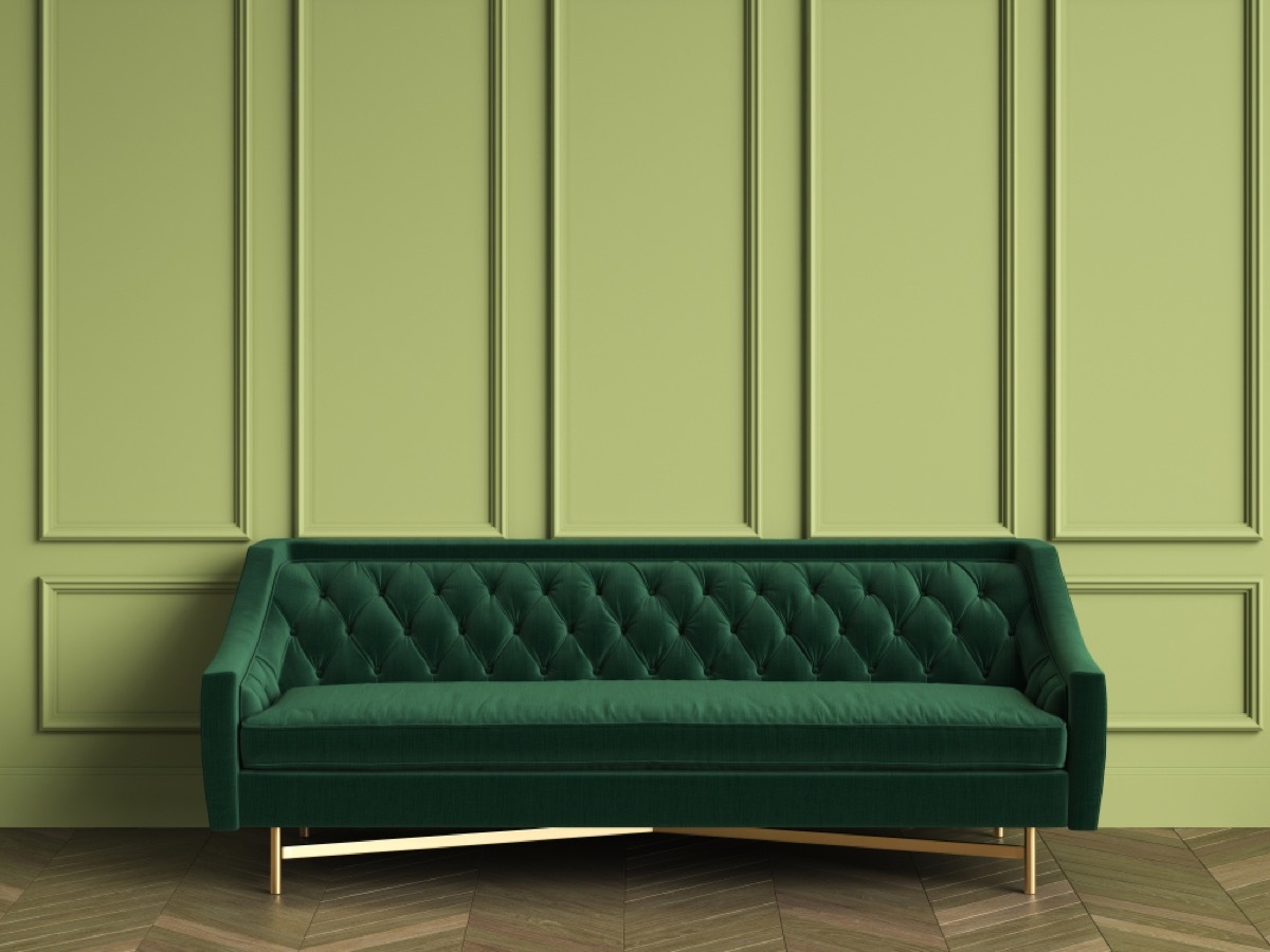 green velvet sofa on green wall, vintage home upgrades