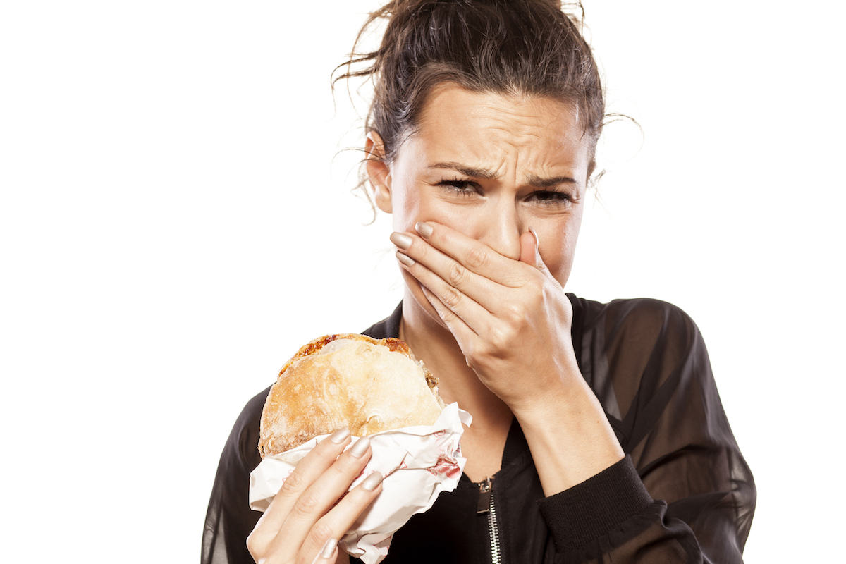 Woman is disgusted by her sandwich