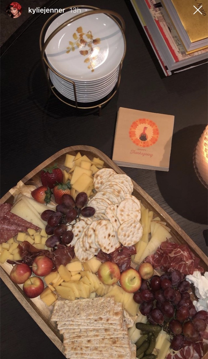 an instagram post of the charcuterie board at kylie jenner's friendsgiving