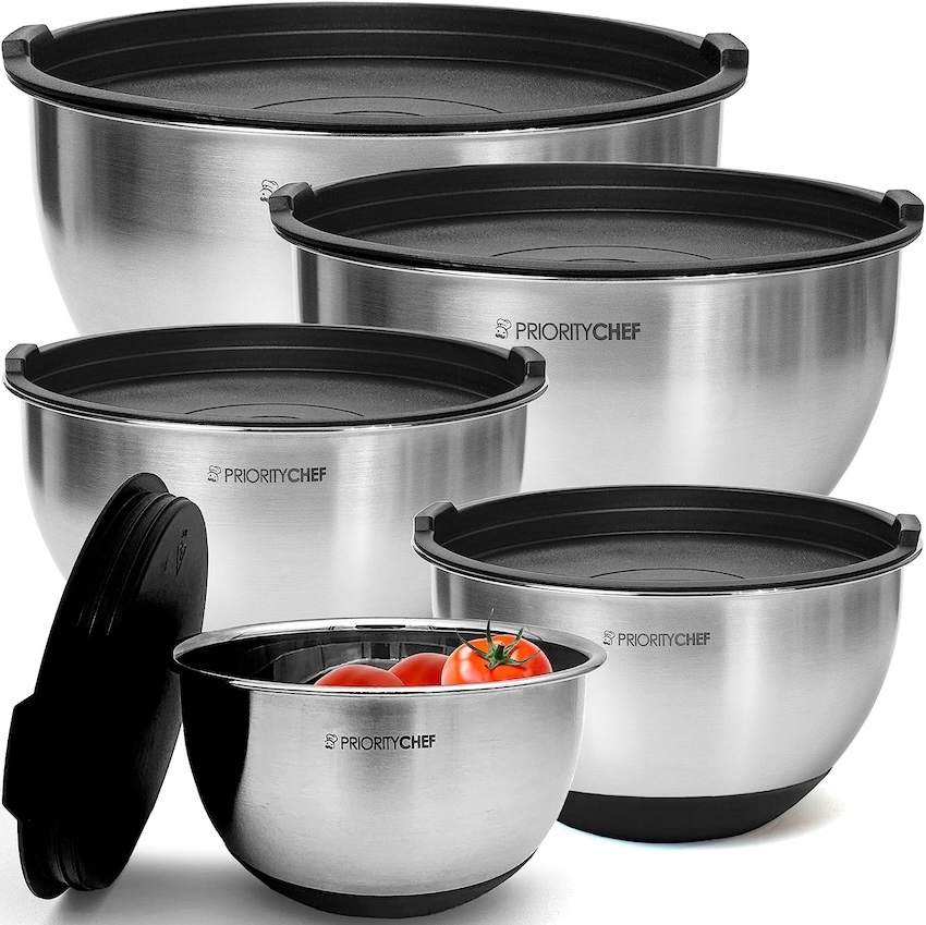 A set of stainless steel mixing bowls with silicone bottoms