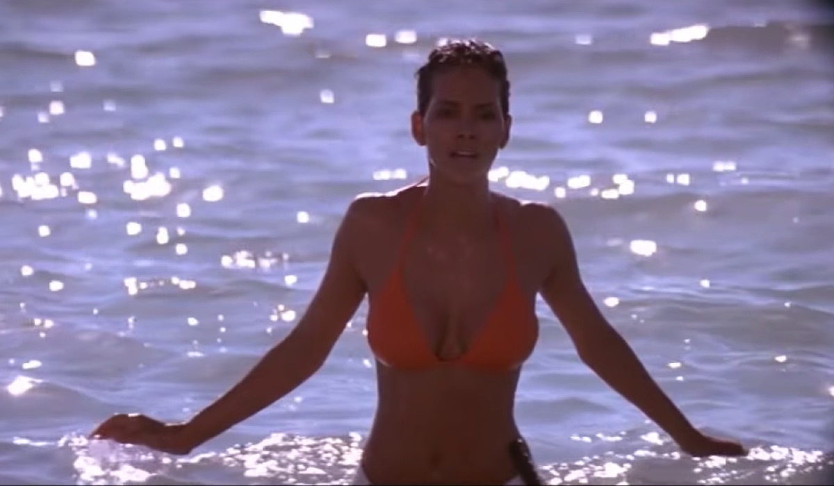 Halle Berry emerges from ocean in orange bikini in Die Another Day, James Bond movie