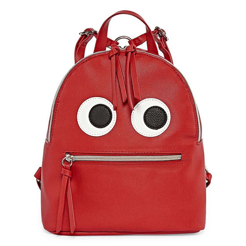 A red backpack with eyes