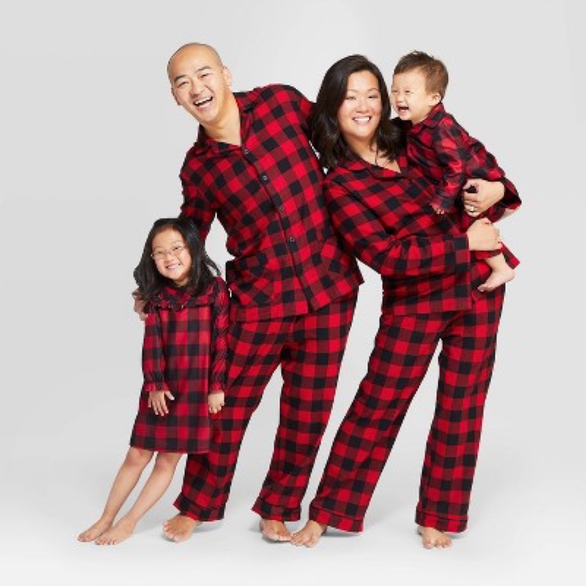 asian family in buffalo check pajamas