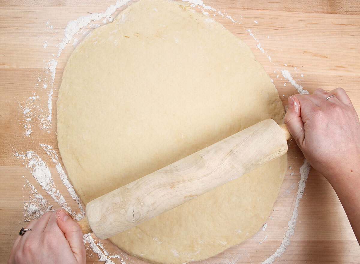 rolling out dough with a rolling pin